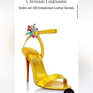 Christian  Louboutin red leather sole.
"Goldie Joli"